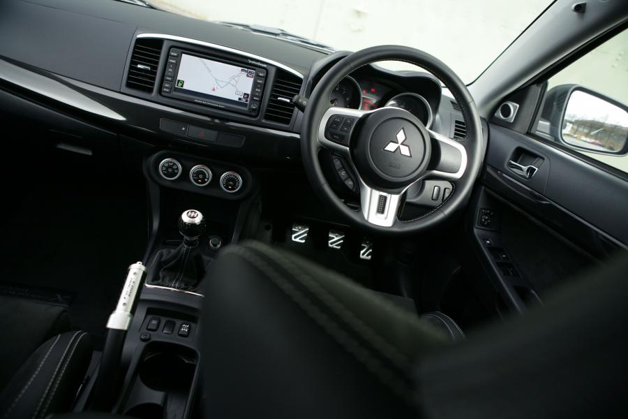  Mitsubishi Lancer Evolution X FQ-400 2009 года  (фото 7 из 64)